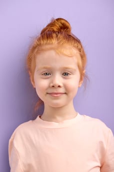 cute-smiling-caucasian-child-girl-with-red-hair-big-blue-eyes-isolated-natural-red-haired-girl-with-freckles-look-front-with-pleasant-face-glad-nice-girl